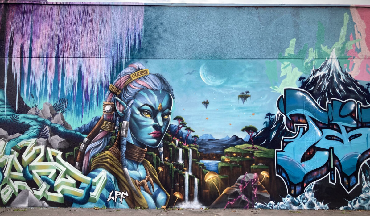 Fresque street art Pandora Avatar avec portrait Na’vi et paysage fantastique réalisée lors de la JAM D’ARC 25 à Cenon.